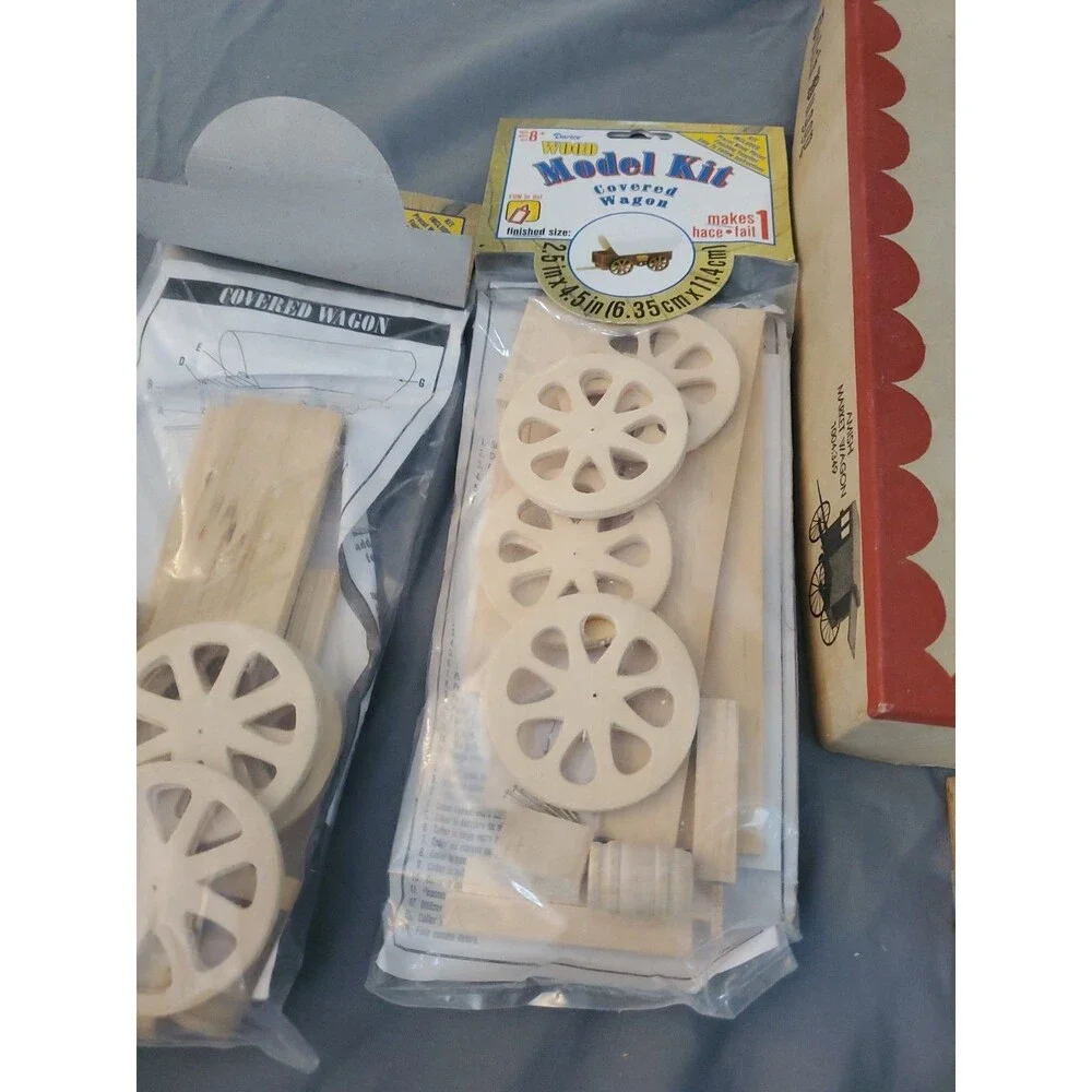 7 Vtg Wood Model Kit Lot Wooden Cover Wagon Log Cabin Sealed Read Gattling Buggy